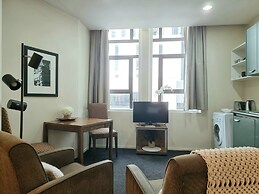 Bright & Cozy 1BR - Kitchen - Laundry