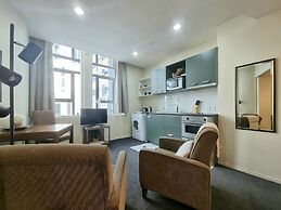 Bright & Cozy 1BR - Kitchen - Laundry