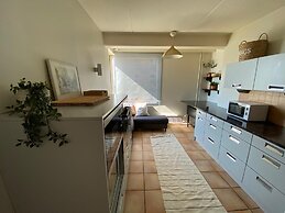 1BR home with Seaview Sauna and Balcony