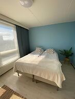 1BR home with Seaview Sauna and Balcony