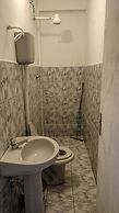 Quarto em Kitnet perto da primeira praia