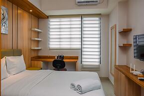 Nice And Cozy Studio At Evenciio Apartment