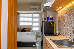 Nice And Cozy Studio At Evenciio Apartment