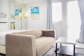 Nice And Comfort Studio Room At Azalea Suites Apartment