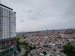 Cozy Living And Simply 2Br At Bassura City Apartment