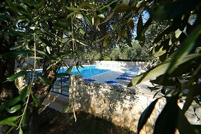 Ferienwohnung Ulivo mit Pool und Privatstrand