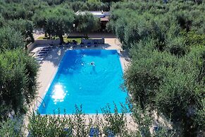 Ferienwohnung Ulivo mit Pool und Privatstrand