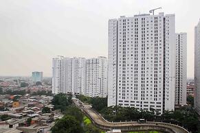 White and Nice 1BR at Bassura City Apartment