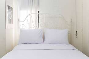 White and Nice 1BR at Bassura City Apartment