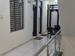 Goroomgo Madhu Palace Katra