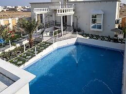 Discovery Guest House -Sur