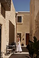 Manili Boutique Suites & Villas