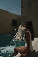 Manili Boutique Suites & Villas