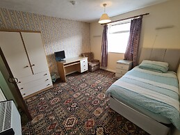 The Coach House Rooms