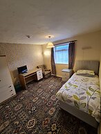 The Coach House Rooms