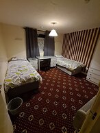 The Coach House Rooms