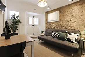 Golden Studio Inside Castle Walls by Homing