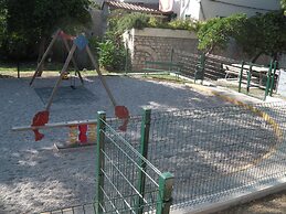 Happy Jackdaw in the Center of Split
