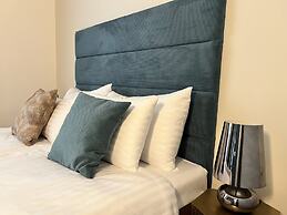 Golden Angel Suites by Adrez Living