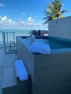 Branco Haus - Pé na Areia do Caribessa