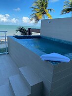 Branco Haus - Pé na Areia do Caribessa