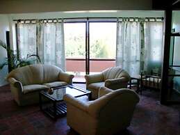 The Planet Apartments