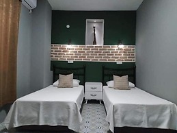 Casa Magnolia Boutique Rooms