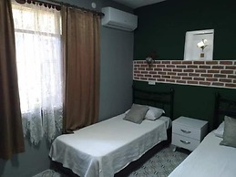 Casa Magnolia Boutique Rooms