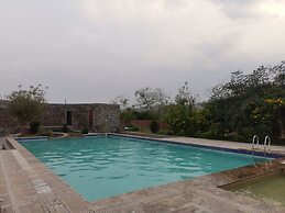 Astroport Sariska Treetop by Eight Continents