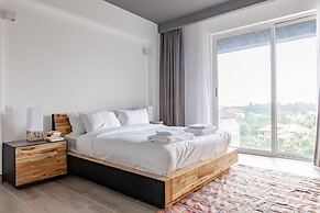 Purple Stays By YourHost