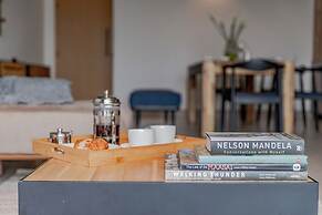 Purple Stays By YourHost