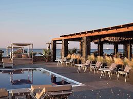 Sea Breeze Santorini Beach Resort, Curio Collection Hilton