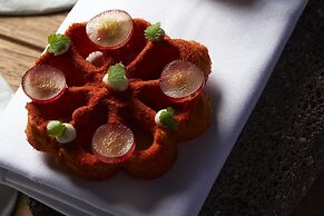 Sea Breeze Santorini Beach Resort, Curio Collection Hilton