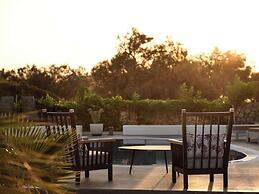 Sea Breeze Santorini Beach Resort, Curio Collection Hilton