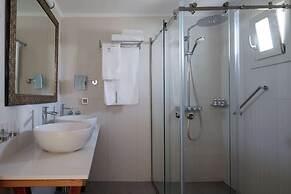 Sea Breeze Santorini Beach Resort, Curio Collection Hilton