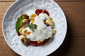 Sea Breeze Santorini Beach Resort, Curio Collection Hilton