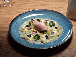 Sea Breeze Santorini Beach Resort, Curio Collection Hilton