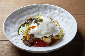 Sea Breeze Santorini Beach Resort, Curio Collection Hilton