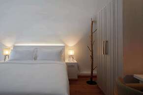 Sea Breeze Santorini Beach Resort, Curio Collection Hilton