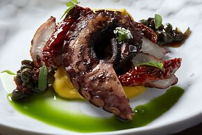 Sea Breeze Santorini Beach Resort, Curio Collection Hilton