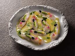 Sea Breeze Santorini Beach Resort, Curio Collection Hilton