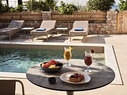 Sea Breeze Santorini Beach Resort, Curio Collection Hilton