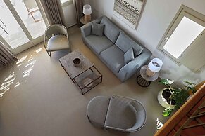 Sea Breeze Santorini Beach Resort, Curio Collection Hilton