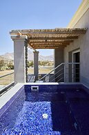 Sea Breeze Santorini Beach Resort, Curio Collection Hilton