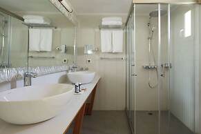 Sea Breeze Santorini Beach Resort, Curio Collection Hilton