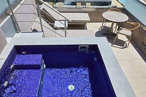 Sea Breeze Santorini Beach Resort, Curio Collection Hilton