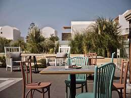 Sea Breeze Santorini Beach Resort, Curio Collection Hilton