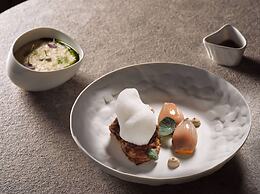 Sea Breeze Santorini Beach Resort, Curio Collection Hilton