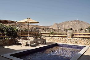 Sea Breeze Santorini Beach Resort, Curio Collection Hilton