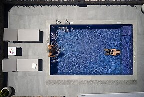 Sea Breeze Santorini Beach Resort, Curio Collection Hilton